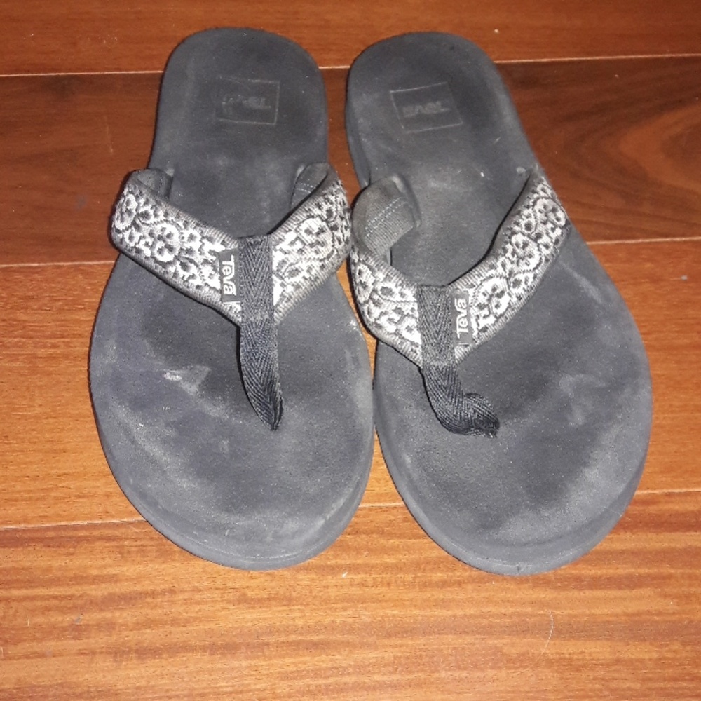 Teva black flip flops